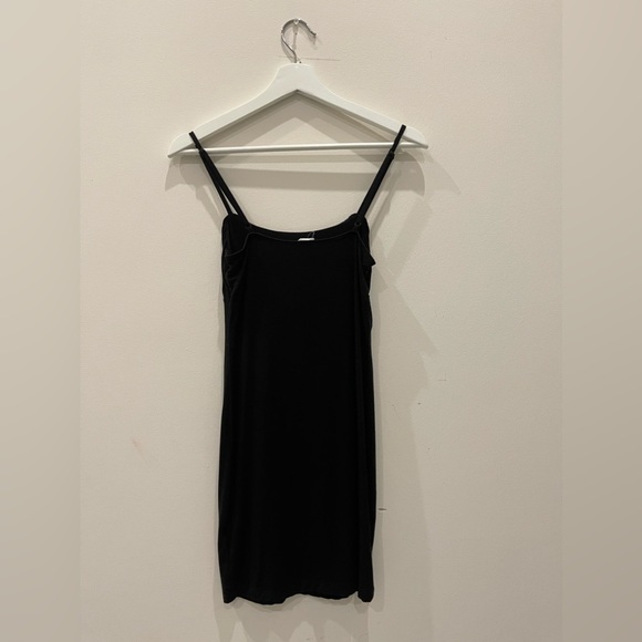 Short black dress XS with ruffled top from Garage. - Picture 2 of 3